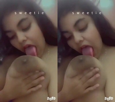 Very-horny-big-tits-girl-indian-porn-tv-sucking-own-big-boobs-mms.jpg